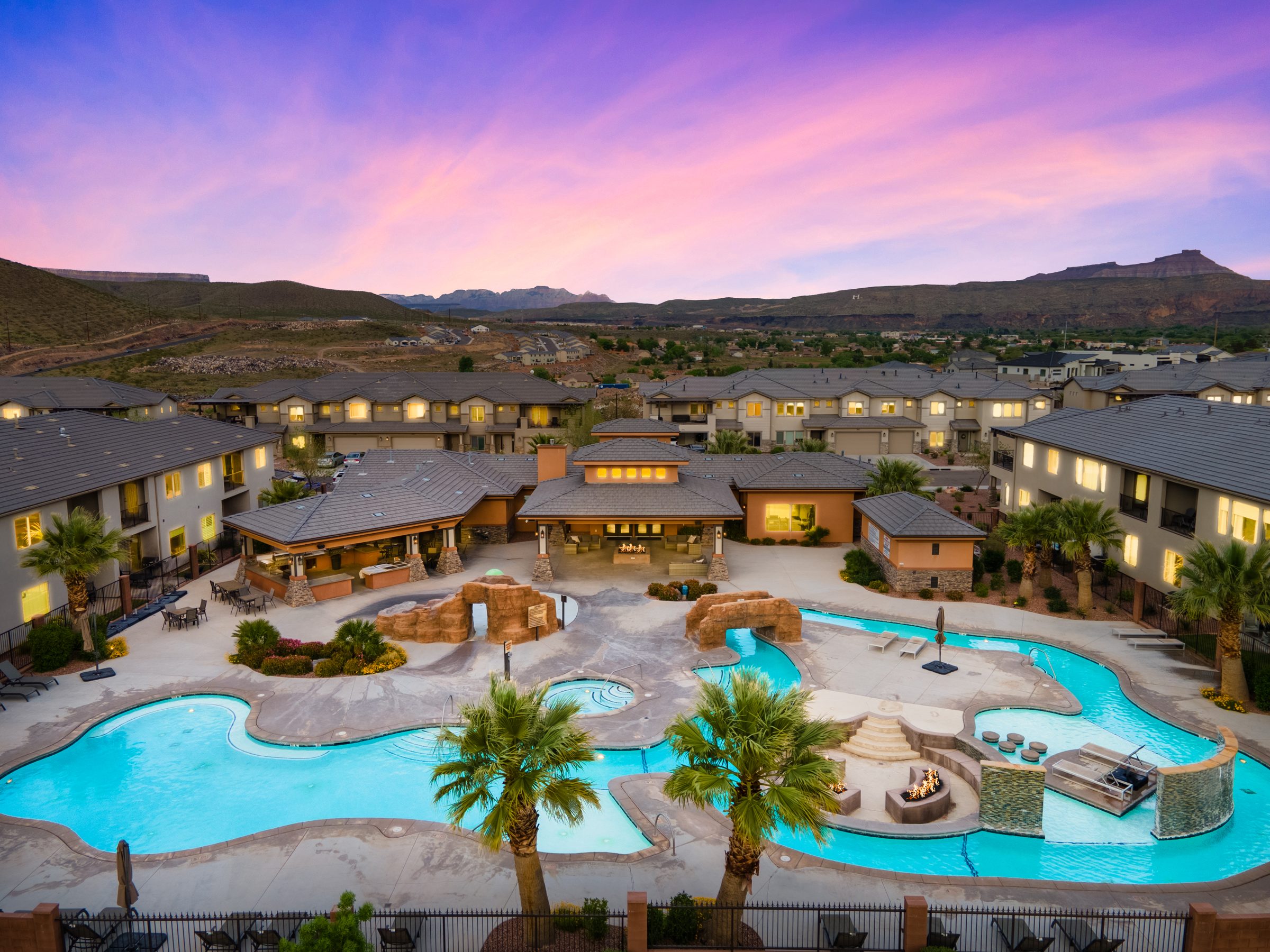 Aerial of the Zion Village resort pool, lazy river, and clubhouse